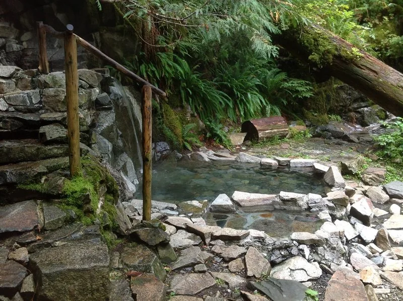 Stone-lined soaking pool and steps at Goldmyer Hot Springs (archive photograph)