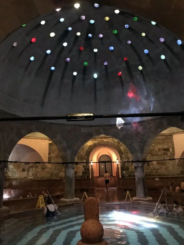 Domed thermal bathing pool inside Rudas Baths in Budapest (archive photograph)