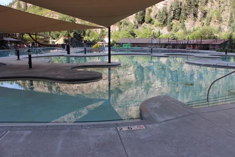 Pool and mountain setting in Ouray, photographed in 2018