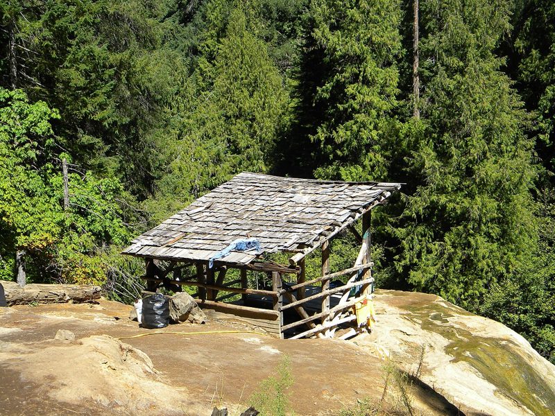 Wooden bathing shelter at the spring at Umpqua Hot Springs (archive photograph)